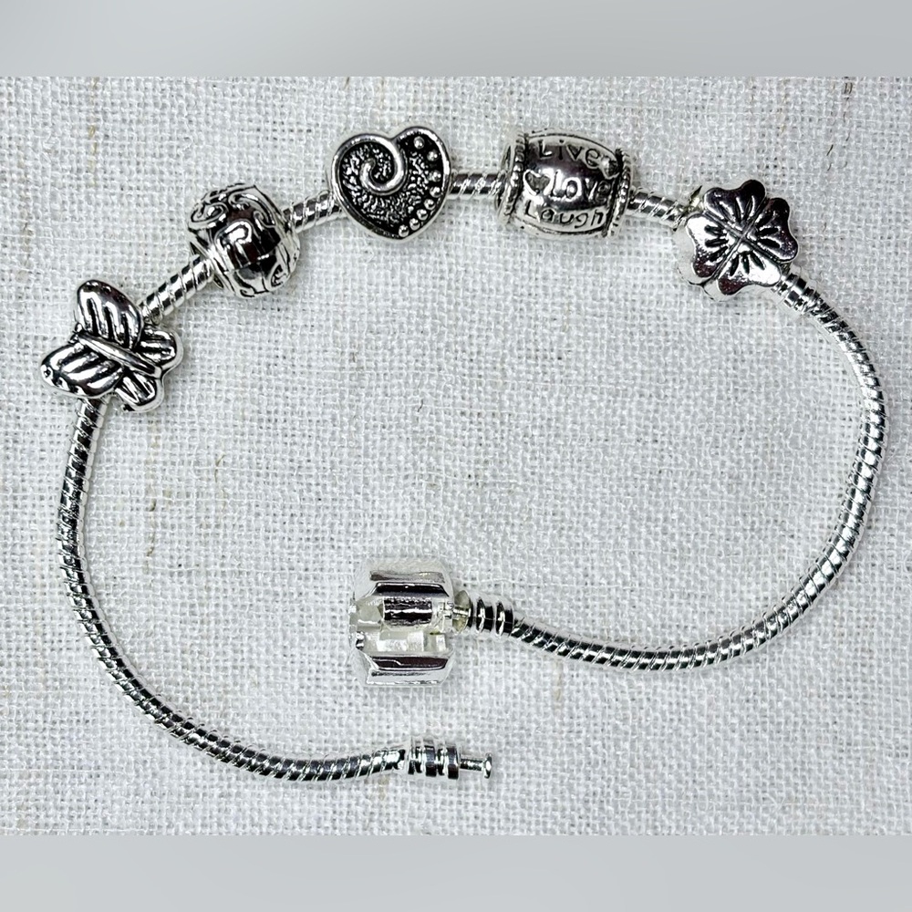 Real 925 sterling silver bracelet w 5 FREE charms of your choice.8.5” long.GIFT